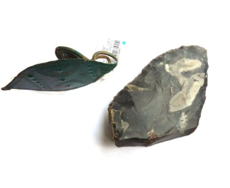 A quantity of antiquities and stone/pottery fragments, also including a flint cutting tool or hand axe, (qty).