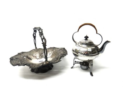 A Victorian plated shaped oval cake or fruit basket, with scroll pierced and embossed decoration and with a swingover handle 