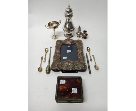 Silver and silver mounted wares, comprising; a sugar caster, London 1920, a twin handled trophy cup, Birmingham 1925, a shape