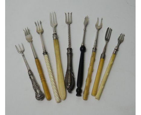 A silver pickle fork, with a spiral decorated carved ivory handle, Sheffield 1914, a Victorian silver pickle fork, with a car