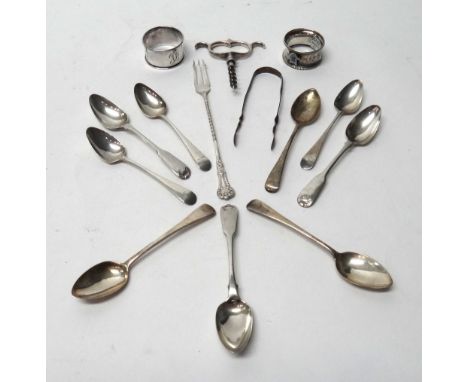 Silver and silver mounted wares, comprising; a corkscrew, a Victorian pickle trident, Birmingham 1895, two napkin rings, thre