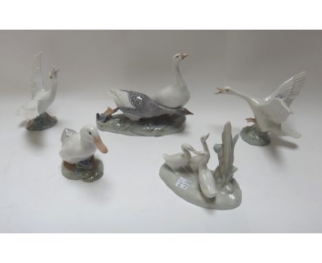 A Royal Copenhagen group of two ducks, no.609, another Royal Copenhagen duck, no.1192, two Lladro geese, and a Nao duck group