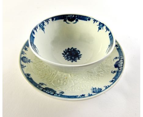 A large Worcester blue and white moulded teabowl and saucer, circa 1770, painted with the `Chrysanthemum' pattern, blue cresc
