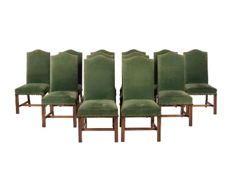 A SET OF TWELVE MAHOGANY AND GREEN VELVET UPHOLSTERED DINING CHAIRS, IN GEORGE II STYLE20TH CENTURYEach with a high back abov