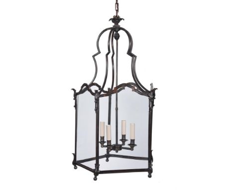 A PAIR OF BRONZED PENTAGONAL HALL LANTERNS IN REGENCY STYLEOF RECENT MANUFACTUREEach with a moulded frame with leaf scroll to
