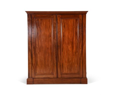 A VICTORIAN MAHOGANY WARDROBEMID 19TH CENTURYWith half sliding trays to interior180cm high, 67cm deep, 203cm wideProvenance: 