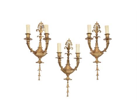 A SET OF THREE GILTMETAL WALL LIGHTS IN EARLY 18TH CENTURY STYLELATE 20TH CENTURYEach with twin arms41cm highCondition Report
