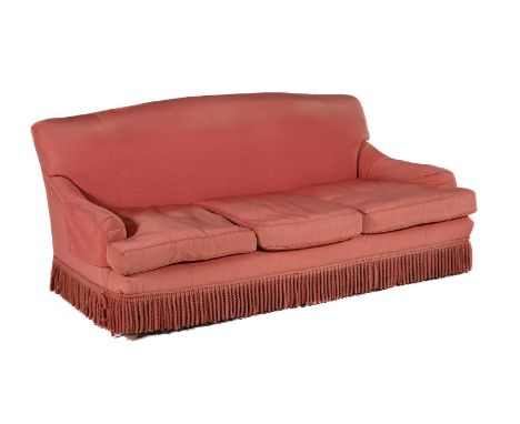 A PAIR OF CORAL PINK UPHOLSTERED THREE SEAT SOFASIN THE MANNER OF HOWARD & SONSeach approximately 81cm high, 186cm wide, 83cm