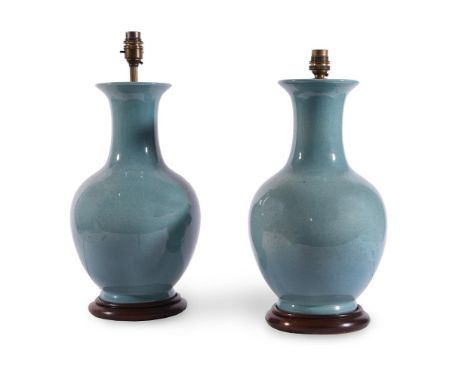 A MODERN PAIR OF TURQUOISE GLAZED CERAMIC TABLE LAMPS IN CHINESE TASTEEach 37cm high (excluding fixtures and shades), 46cm hi