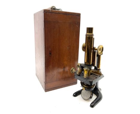 Late 19th/early 20th century brass and black enamelled monocular microscope, probably by Carl Zeiss Jena, with triple adjusta