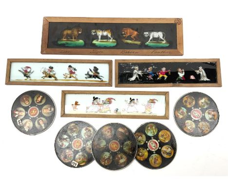 Three early 19th century wood framed glass panoramic magic lantern slides, hand-painted with comical figures including Punch 