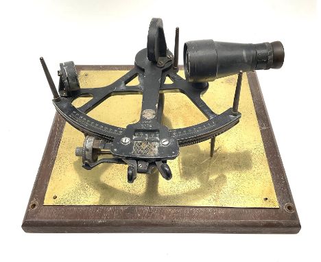 Henry Hughes &amp; Son 'Husun' black finished brass sextant marked H (broad arrow) O No.336; mounted on a mahogany and brasse