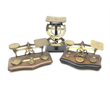 Pair of German Jacob Maul bilateral brass and black enamel postal scales H16cm; and two sets of brass postal scales, each dis