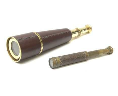 Victorian brass two-draw pocket telescope with leather cover L26cm extended; and modern leather covered lacquered brass three