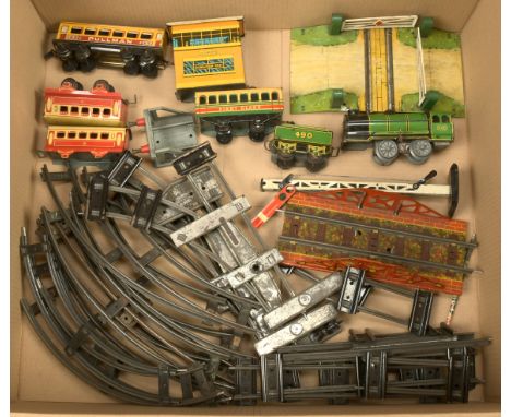 Collection of British made tinplate trains including: Hornby O gauge tinplate train and track; Wells Brimtoy carriages; plus 