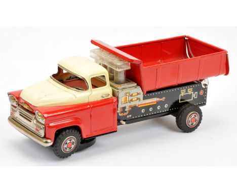 TN Toys (Nomura of Japan) Battery Powered Dump Truck, based on a GMC Cab, tinplate battery operated model with red and cream 