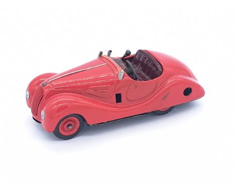 Schuco (Germany) Examico 4001, pre-war tinplate clockwork gear changing car, red body with maroon seats and tinprinted dashbo