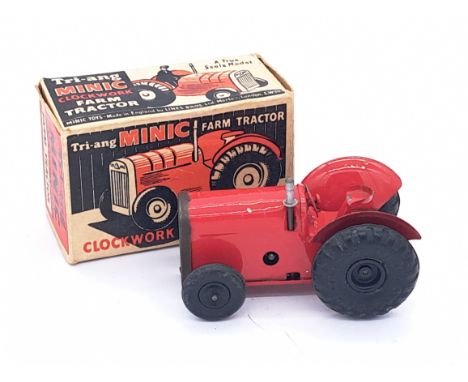 Triang Minic No.83m Farm Tractor, red with black rubber wheels, key wound clockwork motor, MISSING key, within Fair to Good o
