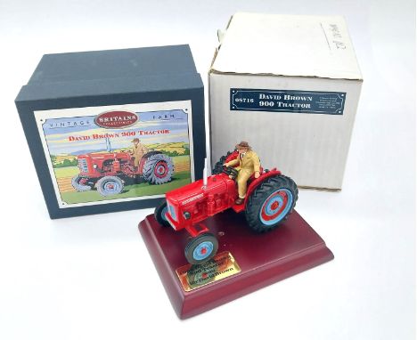 Britains 08716 David Brown 900 Tractor - limited edition finished in red, blue, with figure driver. Appears Excellent with Go