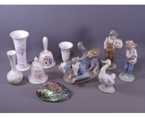 FOUR NAO PORCELAIN FIGURINES with a small selection of porcelain vases and bells, makers include Aynsley, Wedgwood ETC