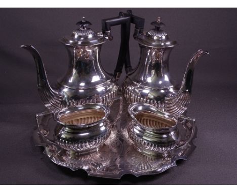 FOUR PIECE ELECTROPLATED TEA SERVICE, each piece of oval form with fluted bodies on a non-matching tray
