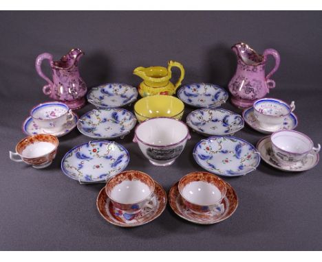 OLD LUSTREWARE - a 19th century yellow lustre jug with floral banding and a similar bowl, a pair of large pink lustre jugs an
