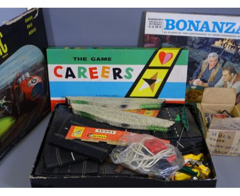 VINTAGE SCALEXTRIC SET, boxed with transformer and two Waddingtons board games, titled 'The Game Careers' and 'Bonanza'