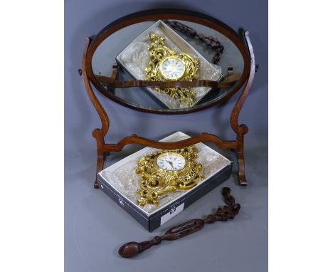 OVAL MAHOGANY TOILET MIRROR, modern gilt wall clock and a carved love spoon