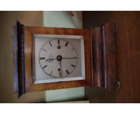 A 19th century rosewood library clock, by Samuel Bartholomew Gaze, the silvered dial inscribed 'S B Gaze, London', with bell 