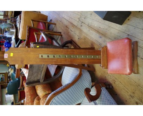 A Victorian walnut artist's adjustable easel rest, labelled 'Newman's, 24 Soho Square, London'.