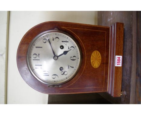 An Edwardian mahogany and inlaid dome top mantel clock, 30cm high.