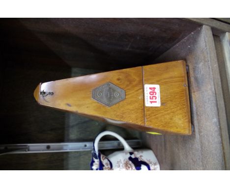 A Maelzel walnut metronome.