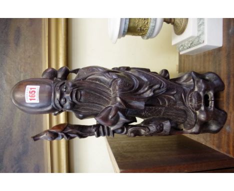 A Japanese carved hardwood figural table lamp, with wire inlay, 41cm high.