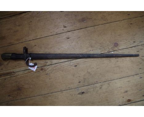 An antique French bayonet and scabbard. 