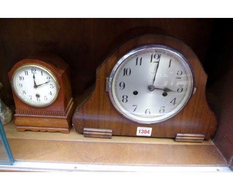 A walnut mantel clock; together with another oak timepiece. 