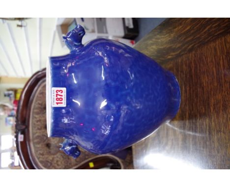 A Chinese blue glazed twin handled vase, Qianlong seal mark, 28cm high. Condition Report: No visible sign of chips or cracks.