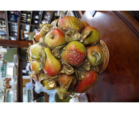 A Continental pottery 'basket of fruit' centrepiece, 34cm high.