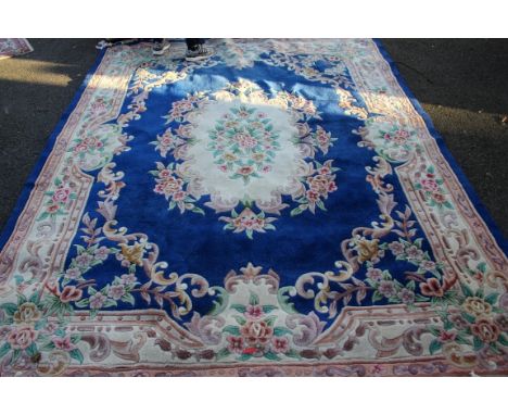 A Chinese floral carpet, 300 x 237cm.