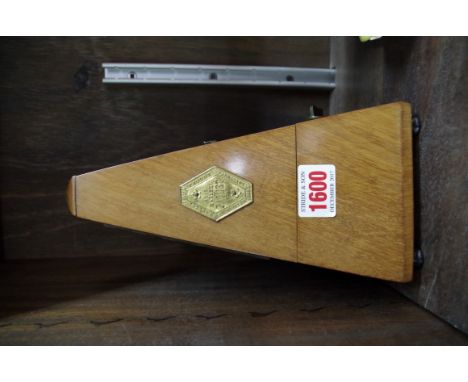 A Maelzel walnut cased metronome.