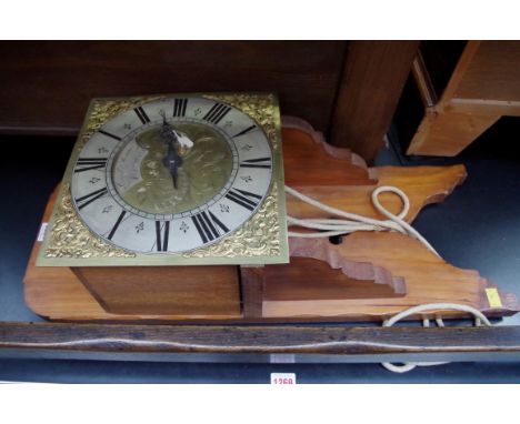 A thirty hour clock hooded wall, the 10in brass dial inscribed 'Charles Snuggs, Farnham'.
