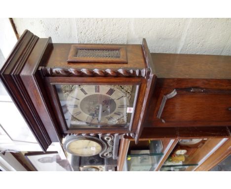 A 1920s oak longcase clock, 188cm high. Condition Report: Pendulum present.  No weights needed.