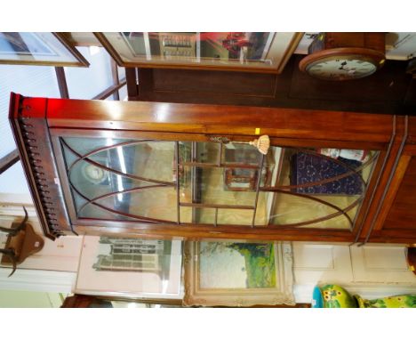 A late George III mahogany standing corner cupboard, 244cm high. Condition Report: Good.  Most elements are original to our e