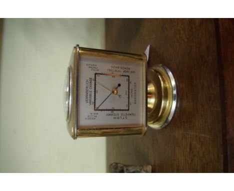 A vintage Angelus five dial combination timepiece and barometer, 10cm high.