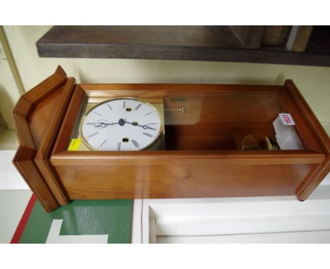 A contemporary Kieninger wall clock, 56.5cm high.