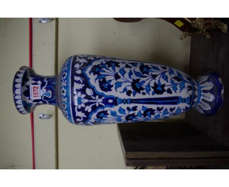 An Iznik style pottery vase, 45.5cm high.