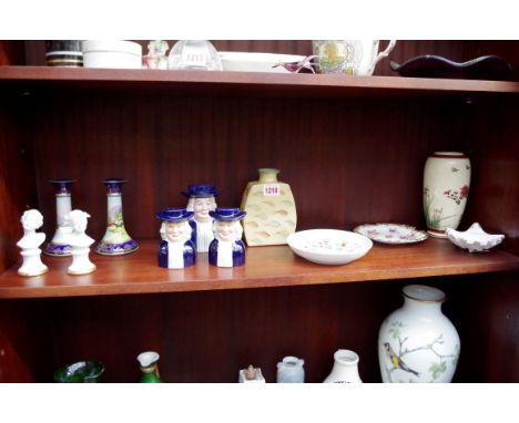 A mixed lot of pottery and porcelain. (two shelves)