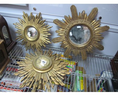 Two Gilt Sunburst Wall Mirrors, and clock.
