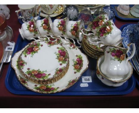 A Royal Albert 'Old Country Roses' Tea Service, comprising cake plate, six tea plates, six tea cups and saucers, milk jug and
