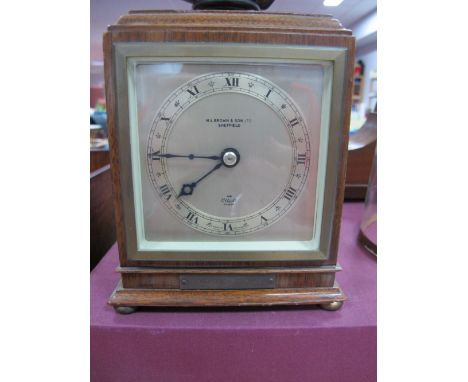 H. L. Brown & Son Ltd Sheffield; An Oak Cased Elliott Mantel Clock, the signed dial with black Roman numerals, the case with 