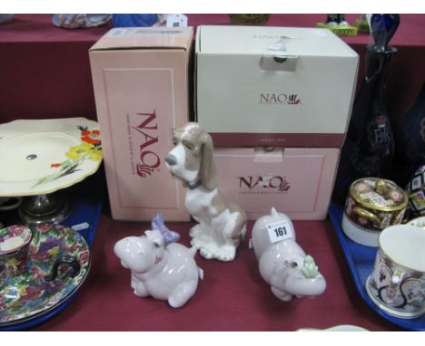 Three Nao Figures - Cupid the Frog, Will He Like Me? and a Sad Looking Hound, all with boxes. (3)